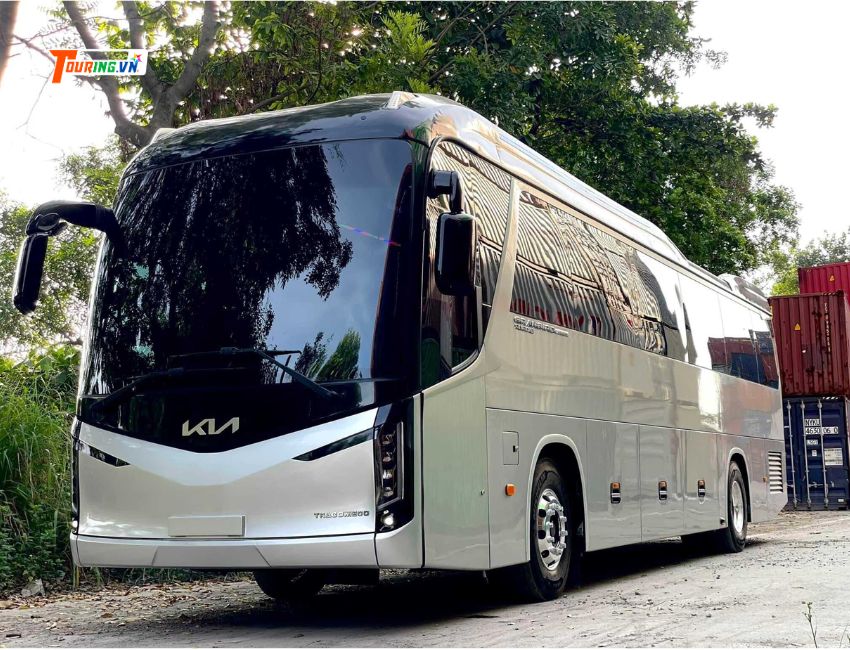 Owner-supplied white Kia 45-seat coach